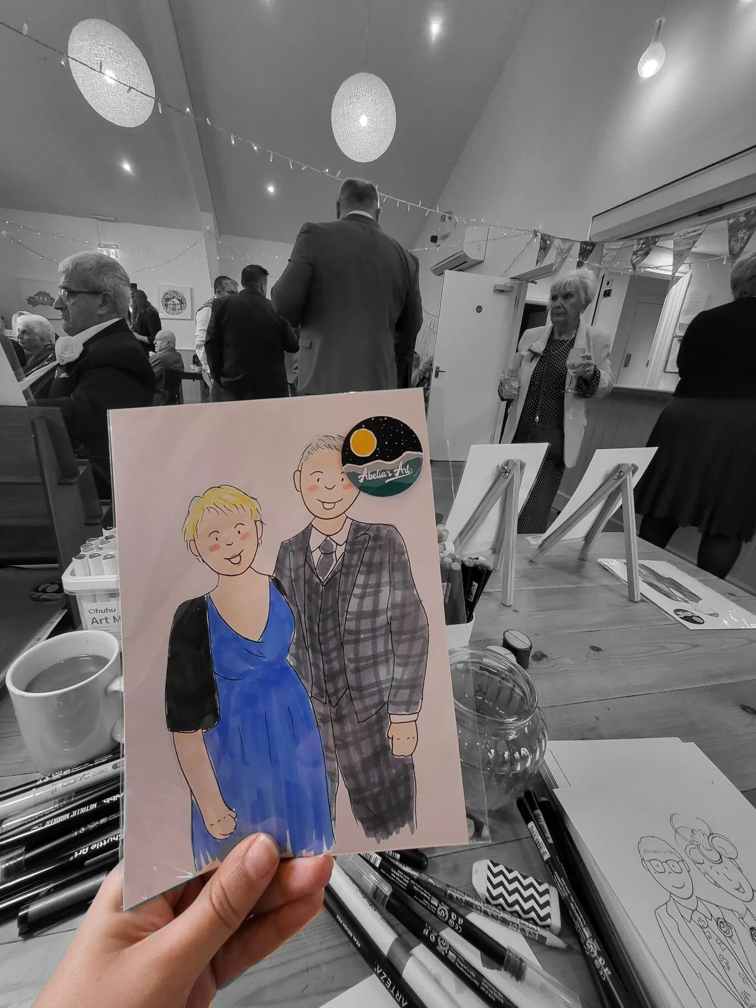 Guests watching a live sketch come together at The Green, Cornwall