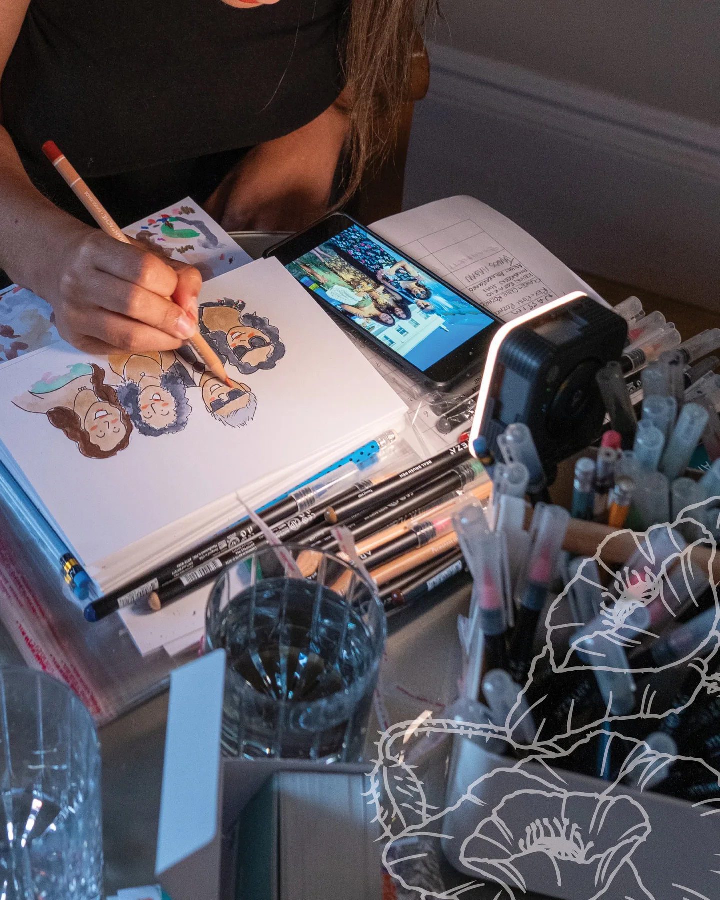 Annabelle drawing live guest portraits at an elegant venue